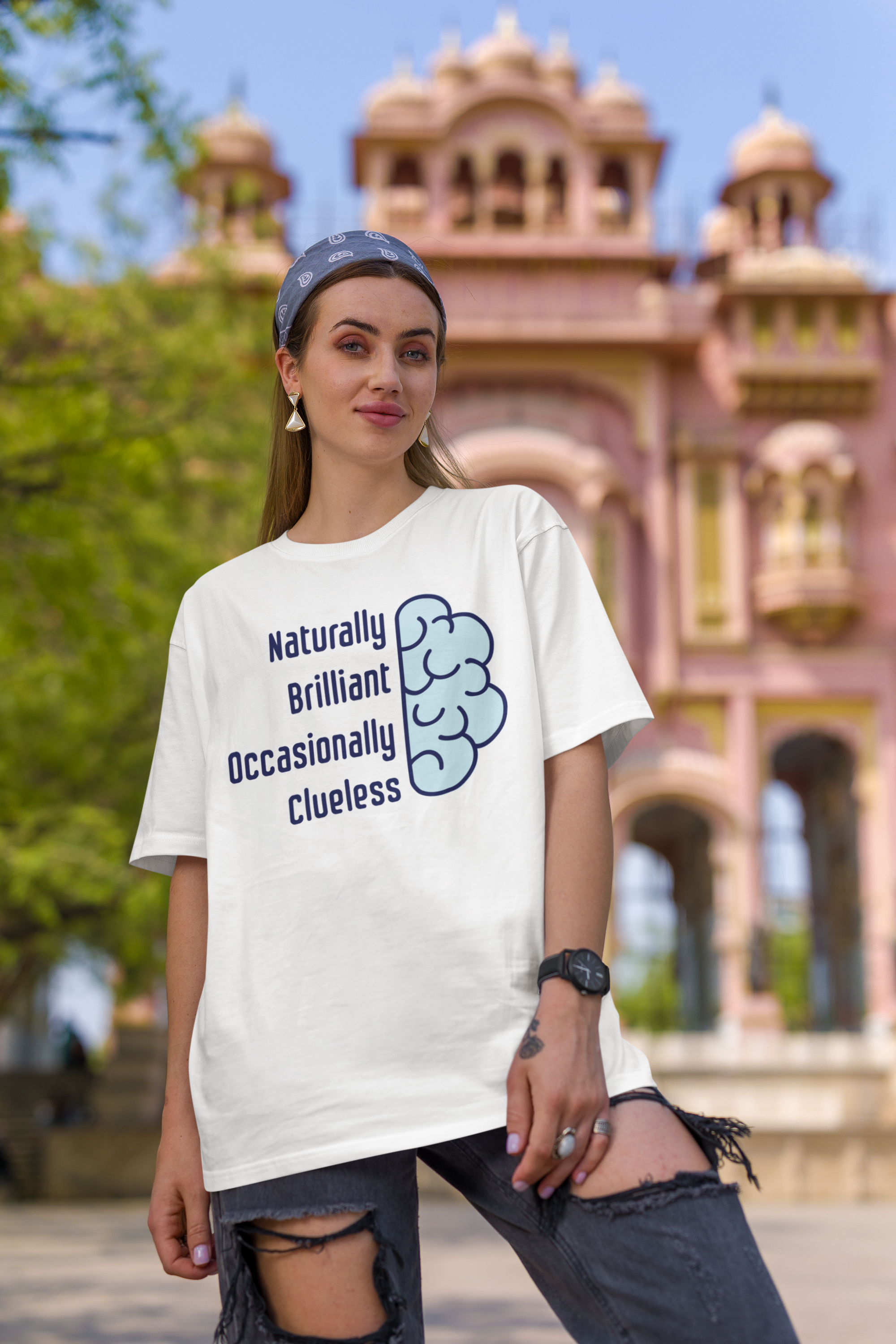 'Naturally Brilliant Occasionally Clueless' Women's Oversized Cotton T-Shirt