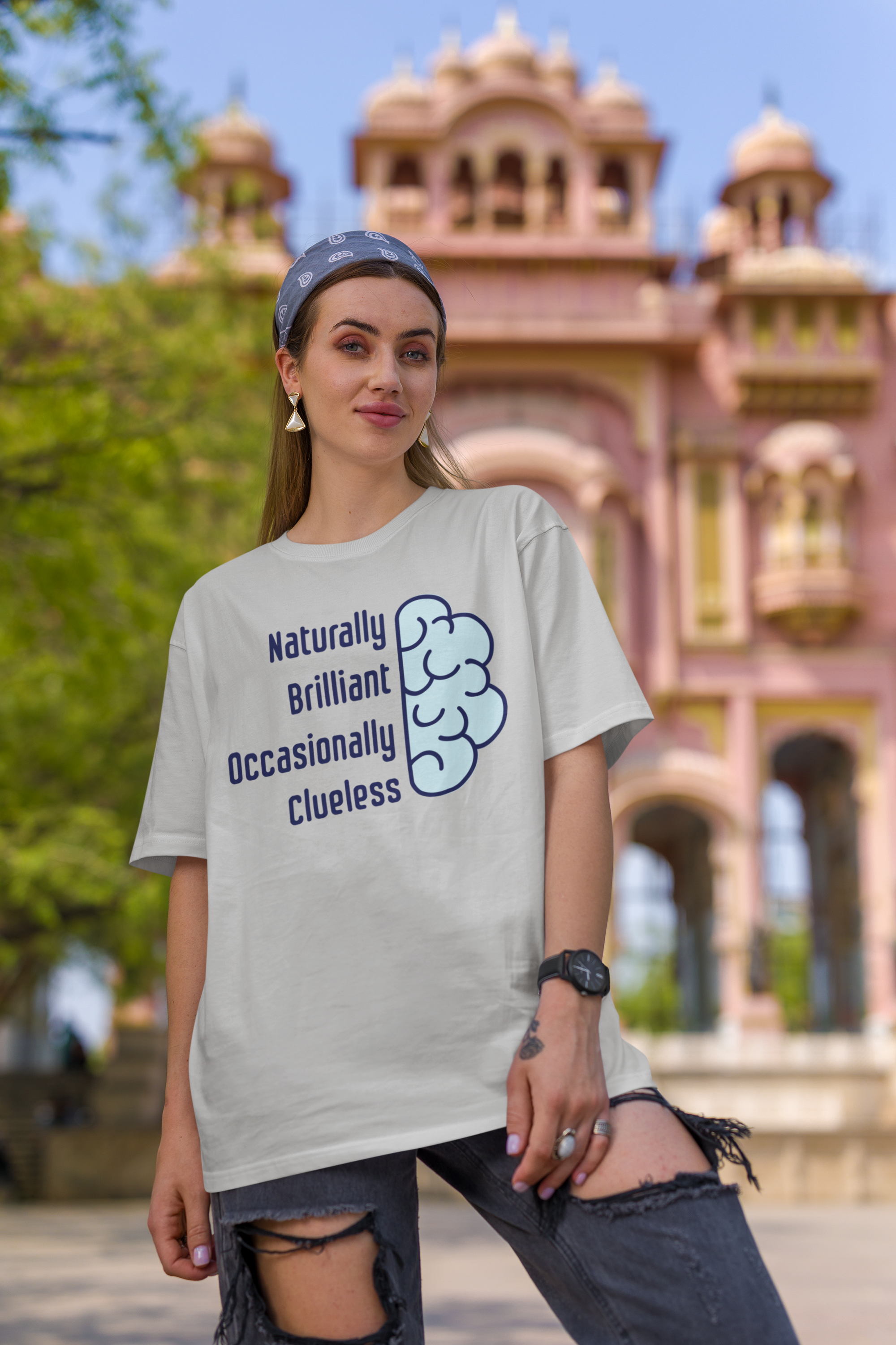 'Naturally Brilliant Occasionally Clueless' Women's Oversized Cotton T-Shirt