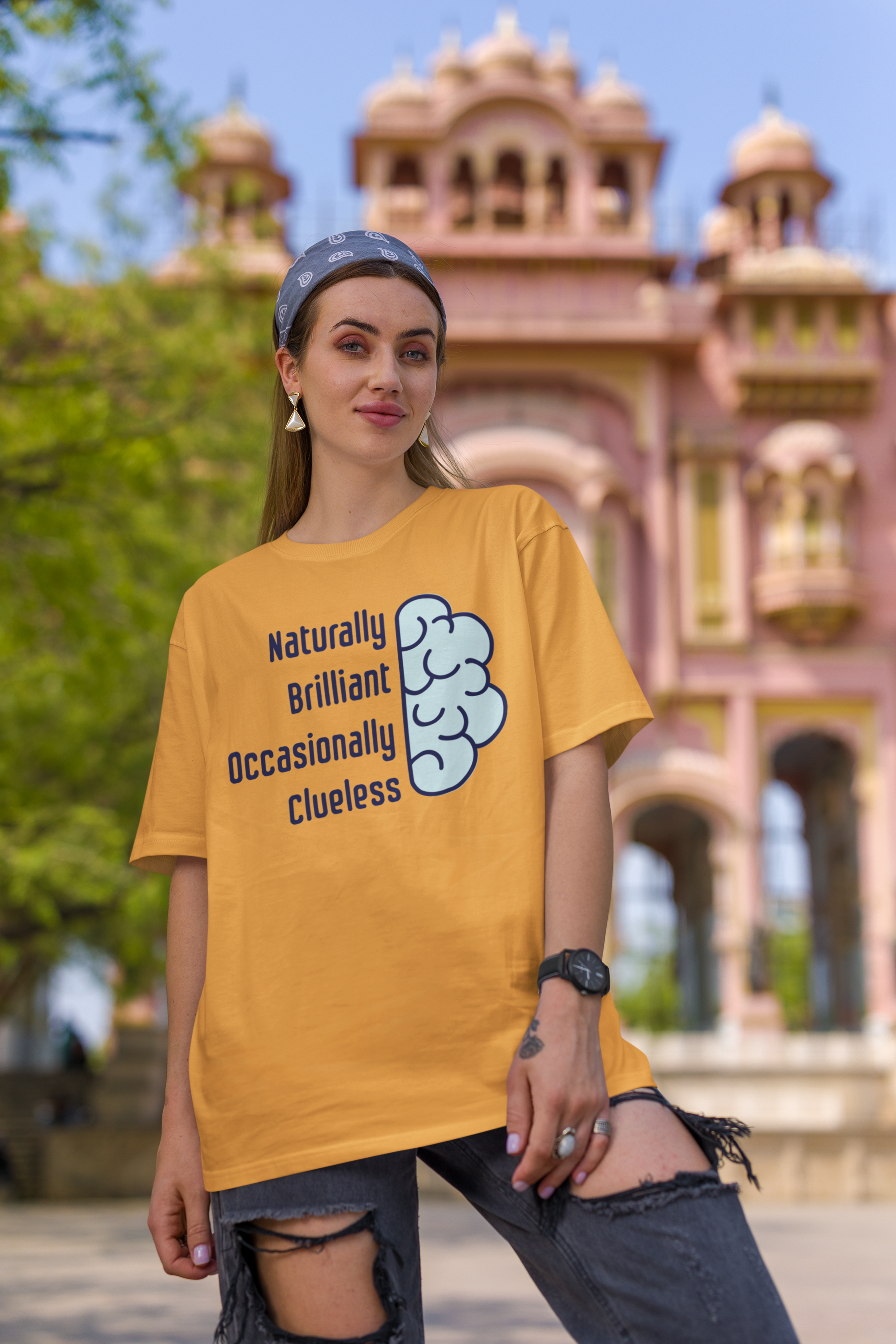 'Naturally Brilliant Occasionally Clueless' Women's Oversized Cotton T-Shirt