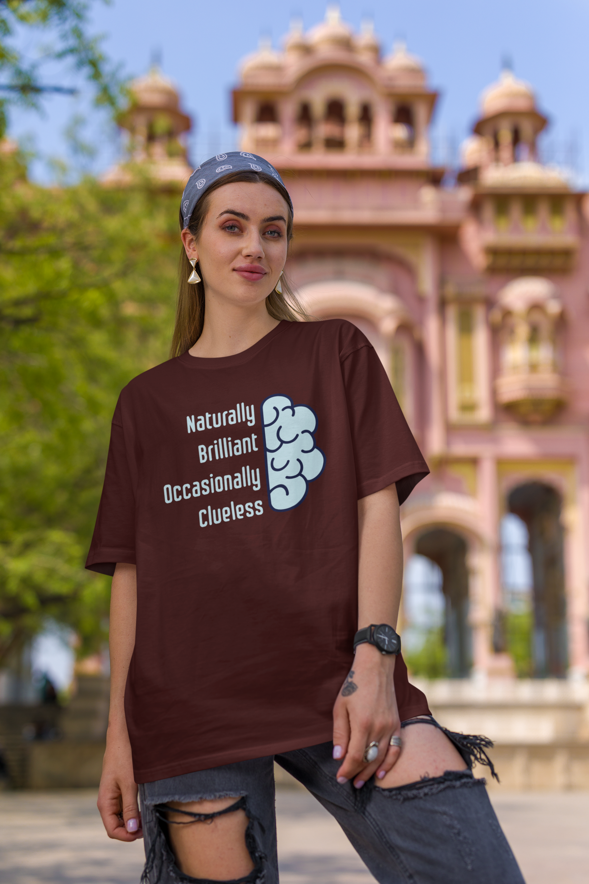 'Naturally Brilliant Occasionally Clueless' Women's Oversized Cotton T-Shirt