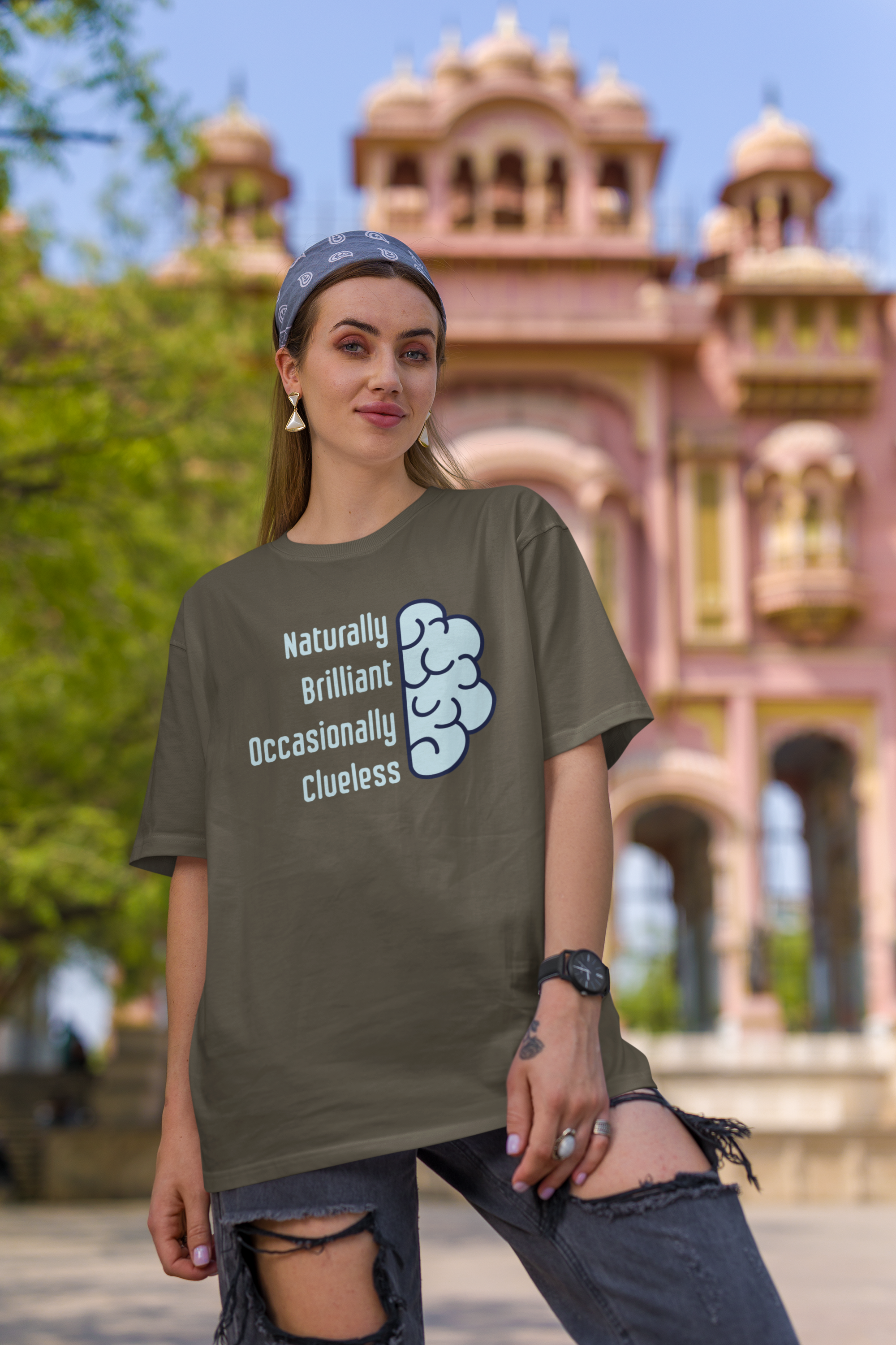 'Naturally Brilliant Occasionally Clueless' Women's Oversized Cotton T-Shirt