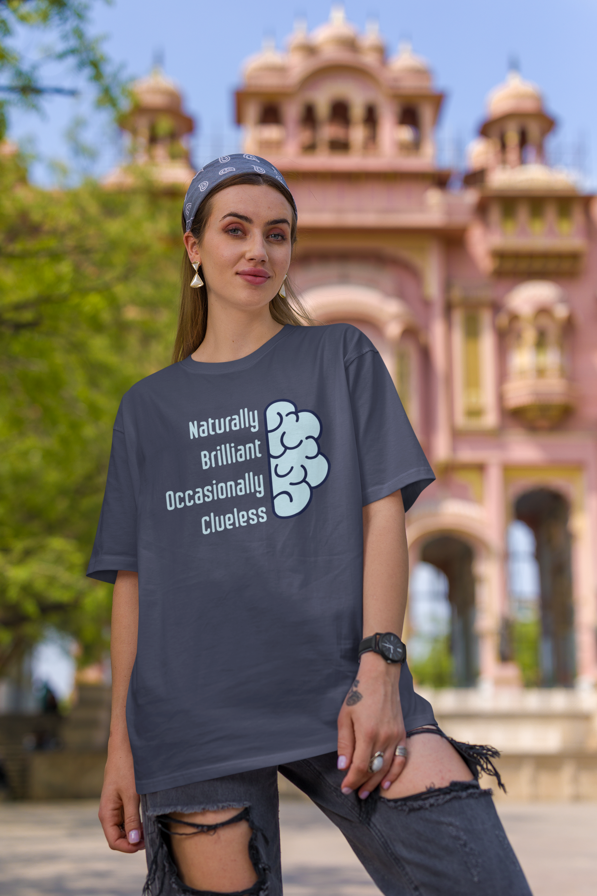 'Naturally Brilliant Occasionally Clueless' Women's Oversized Cotton T-Shirt